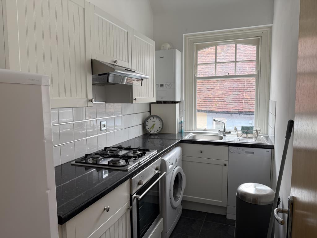 Lot: 53 - ONE-BEDROOM FLAT FOR INVESTMENT OR OCCUPATION - Modern fitted kitchen with goods